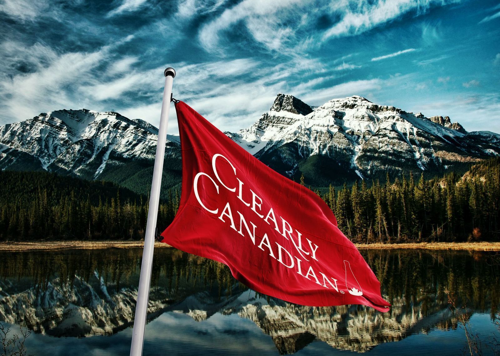 Clearly Canadian Flag with Lake and Mountains